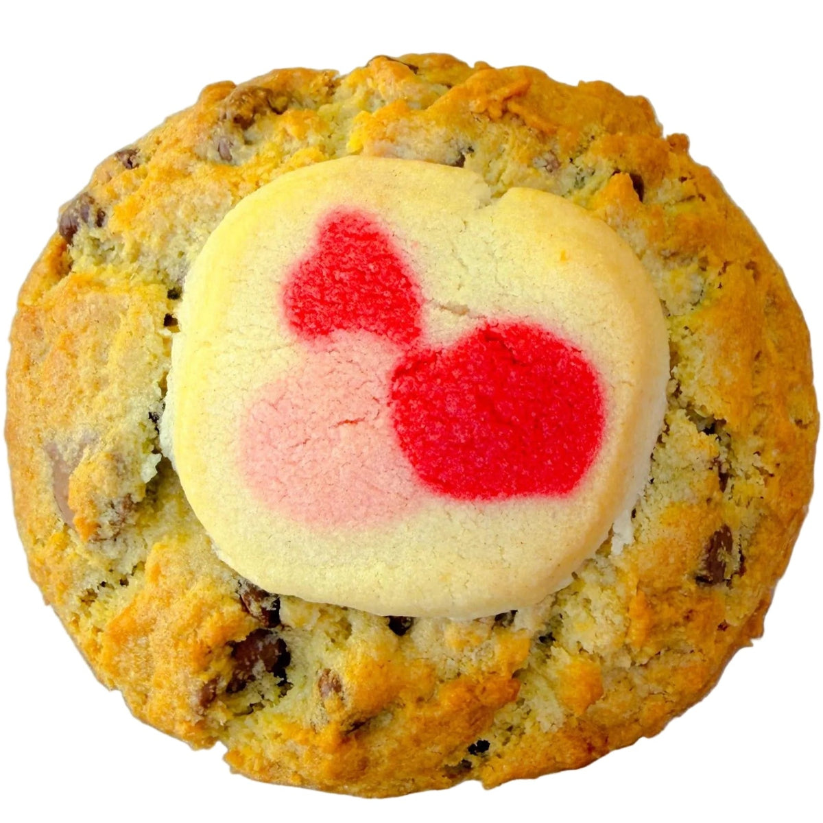 Cookie with a round white candy center featuring red and pink heart designs on a light gray background.